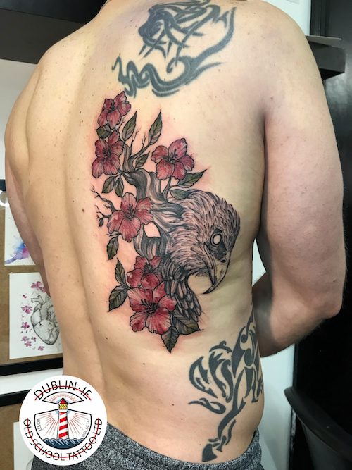 eagle and flowers tattoo